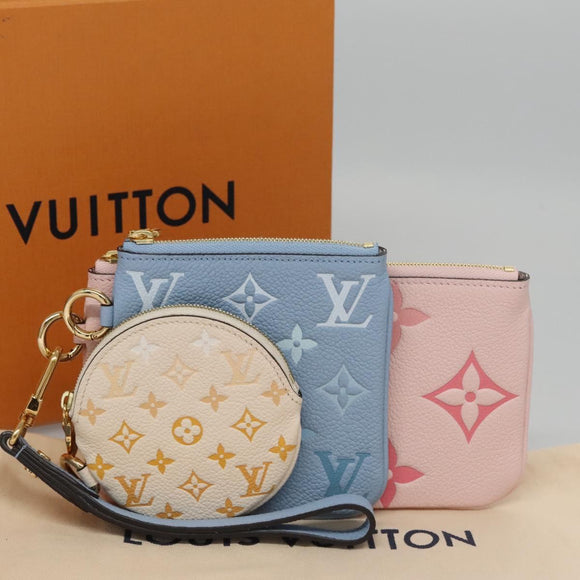 LOUIS VUITTON Monogram Empreinte Pochette Trio Pouch Pink M80407 LV Auth 107585SM