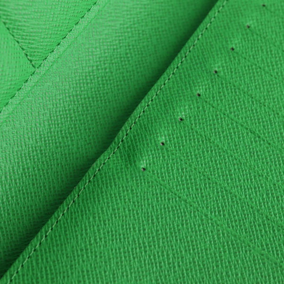 LOUIS VUITTON Monogram LV Portrait Zippy Vertical Wallet M82590 LV Auth 116099AM