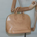LOUIS VUITTON Nomad leather Alma Hand Bag Beige M85000 LV Auth 118529-21