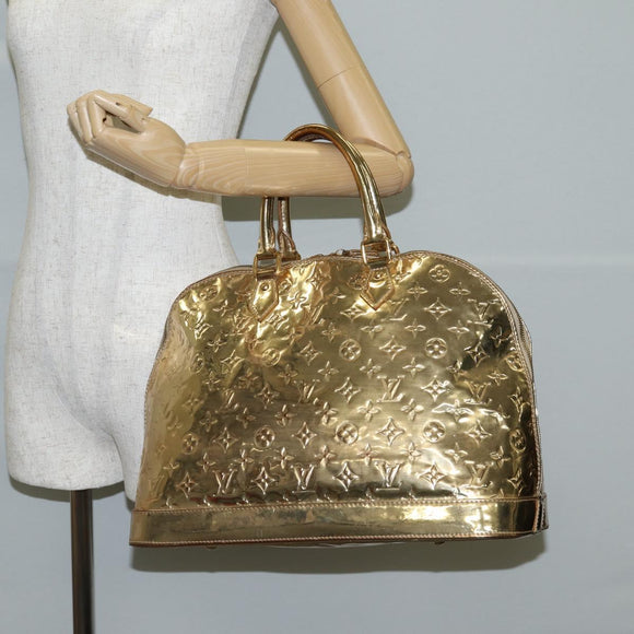 LOUIS VUITTON Monogram Miroir Alma MM Hand Bag Gold Dore M93624 LV Auth 122881