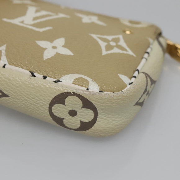 LOUIS VUITTON Monogram Giant Mini Pochette Pouch Ivory M67579 Auth 136302