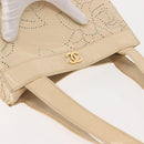 CHANEL Camelia Tote Bag Patent leather Beige Gold CC Auth 149325-6