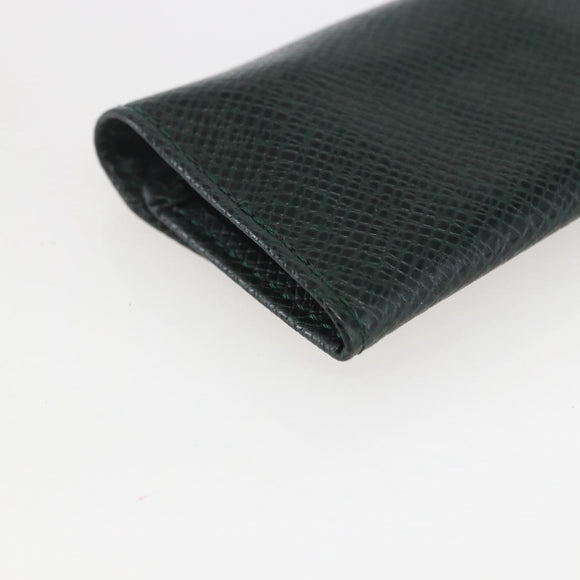 LOUIS VUITTON Taiga Buton De Manchette Cuffs metal Gold Tone LV Auth 156221