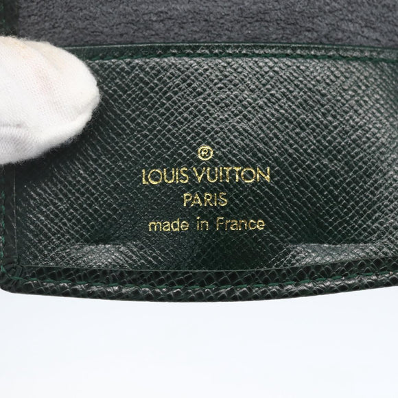 LOUIS VUITTON Taiga Buton De Manchette Cuffs metal Gold Tone LV Auth 156221