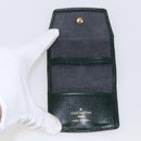 LOUIS VUITTON Taiga Buton De Manchette Cuffs metal Gold Tone LV Auth 156221-9