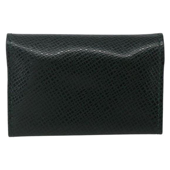 LOUIS VUITTON Taiga Buton De Manchette Cuffs metal Gold Tone LV Auth 156221