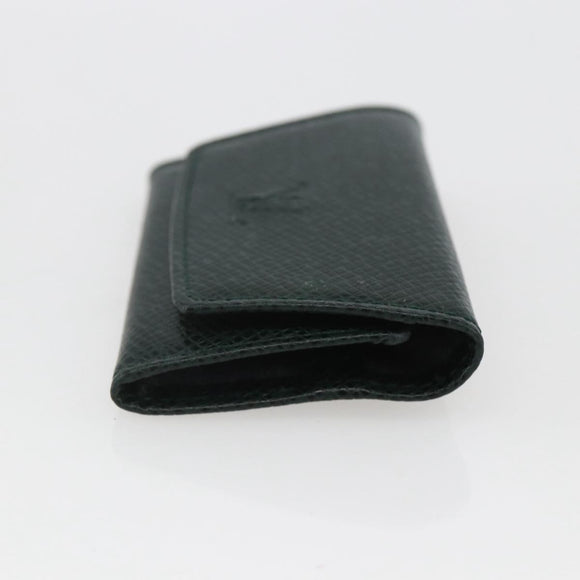 LOUIS VUITTON Taiga Buton De Manchette Cuffs metal Gold Tone LV Auth 156221