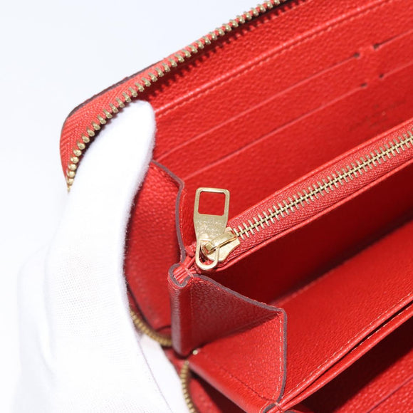 LOUIS VUITTON Monogram Empreinte Zippy Long Wallet Orange M60775 LV Auth 173020V