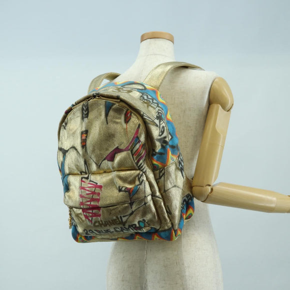 CHANEL Graphic Backpack Coated Canvas Gold CC Auth 177236SM
