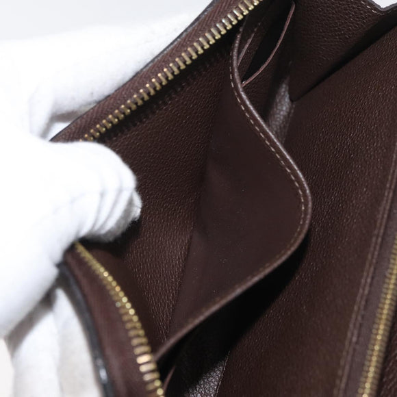 LOUIS VUITTON Monogram Empreinte Zippy Wallet Dark Brown M60548 LV Auth 178383A