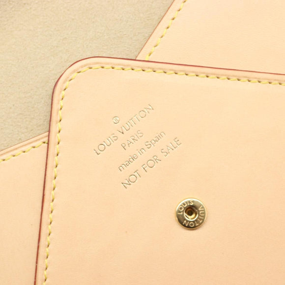 LOUIS VUITTON Nomad leather Clutch Bag Beige LV Auth 196985V