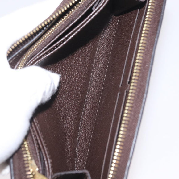 LOUIS VUITTON Monogram Empreinte Zippy Wallet Dark Brown M60548 LV Auth 208340