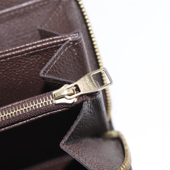 LOUIS VUITTON Monogram Empreinte Zippy Wallet Dark Brown M60548 LV Auth 208340