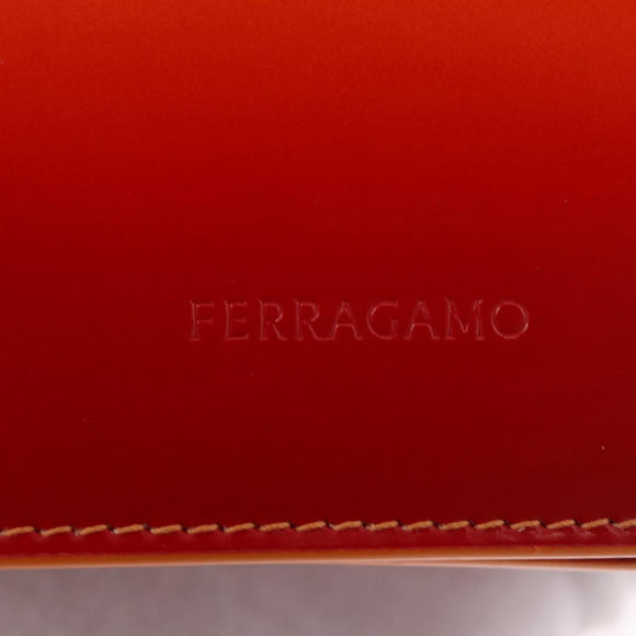 Salvatore Ferragamo Metal Hand Pouch Patent leather Orange Silver Auth 208342M