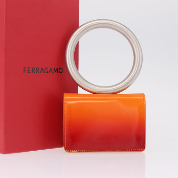 Salvatore Ferragamo Metal Hand Pouch Patent leather Orange Silver Auth 208342M