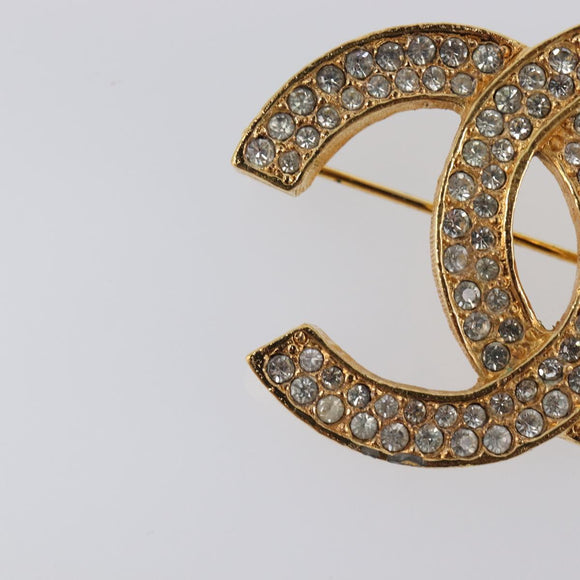 CHANEL Brooch metal Gold CC Auth 208721M