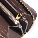 LOUIS VUITTON Monogram Empreinte Zippy Long Wallet Dark Brown M60548 Auth 213628-18