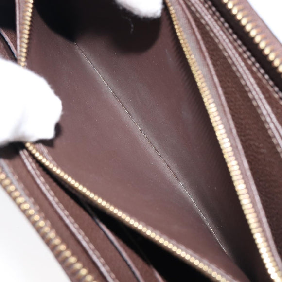 LOUIS VUITTON Monogram Empreinte Zippy Long Wallet Dark Brown M60548 Auth 213628