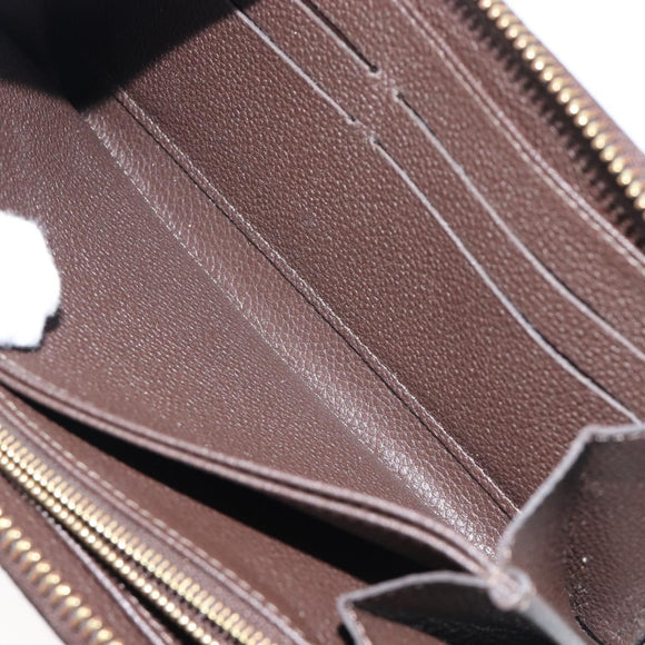 LOUIS VUITTON Monogram Empreinte Zippy Long Wallet Dark Brown M60548 Auth 213628
