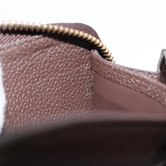 LOUIS VUITTON Monogram Empreinte Zippy Long Wallet Dark Brown M60548 Auth 213628