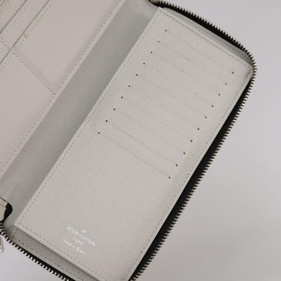 LOUIS VUITTON Taigalama Zippy Wallet Vertical Wallet White M30446 LV Auth am7452