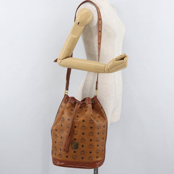 MCM Vicetos Logogram Drawstring Bag Bag PVC Leather Brown Gold Auth BA12441A