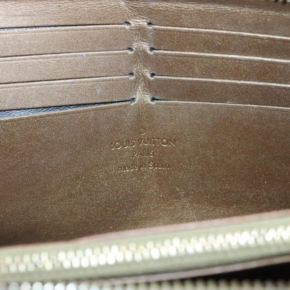LOUIS VUITTON Suhari Zippy Wallet Leather Bronze M95701 LV Auth fm4650