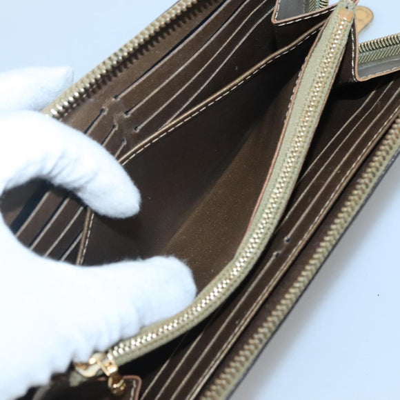 LOUIS VUITTON Suhari Zippy Wallet Leather Bronze M95701 LV Auth fm4650