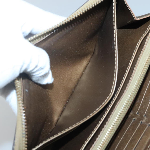 LOUIS VUITTON Suhari Zippy Wallet Leather Bronze M95701 LV Auth fm4650