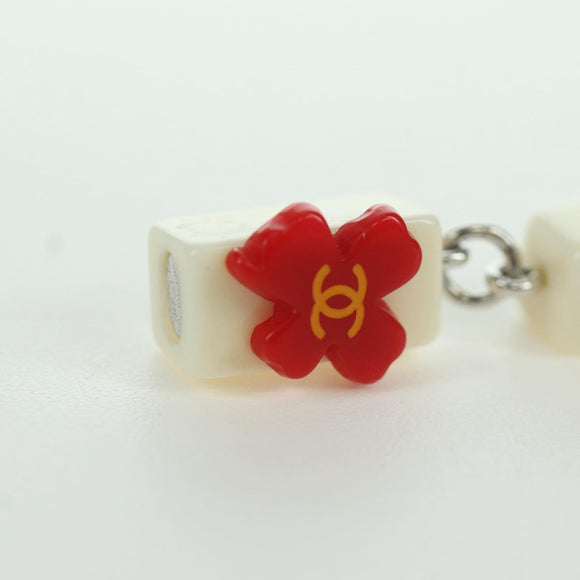 CHANEL COCO Mark Camellia Pierce plastic White CC Auth YKZ574M