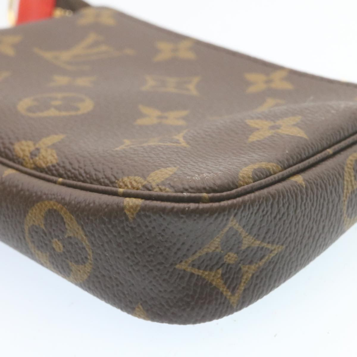 LOUIS VUITTON Monogram Vivienne Mini Pochette Accessoires M69976 Auth 28293A