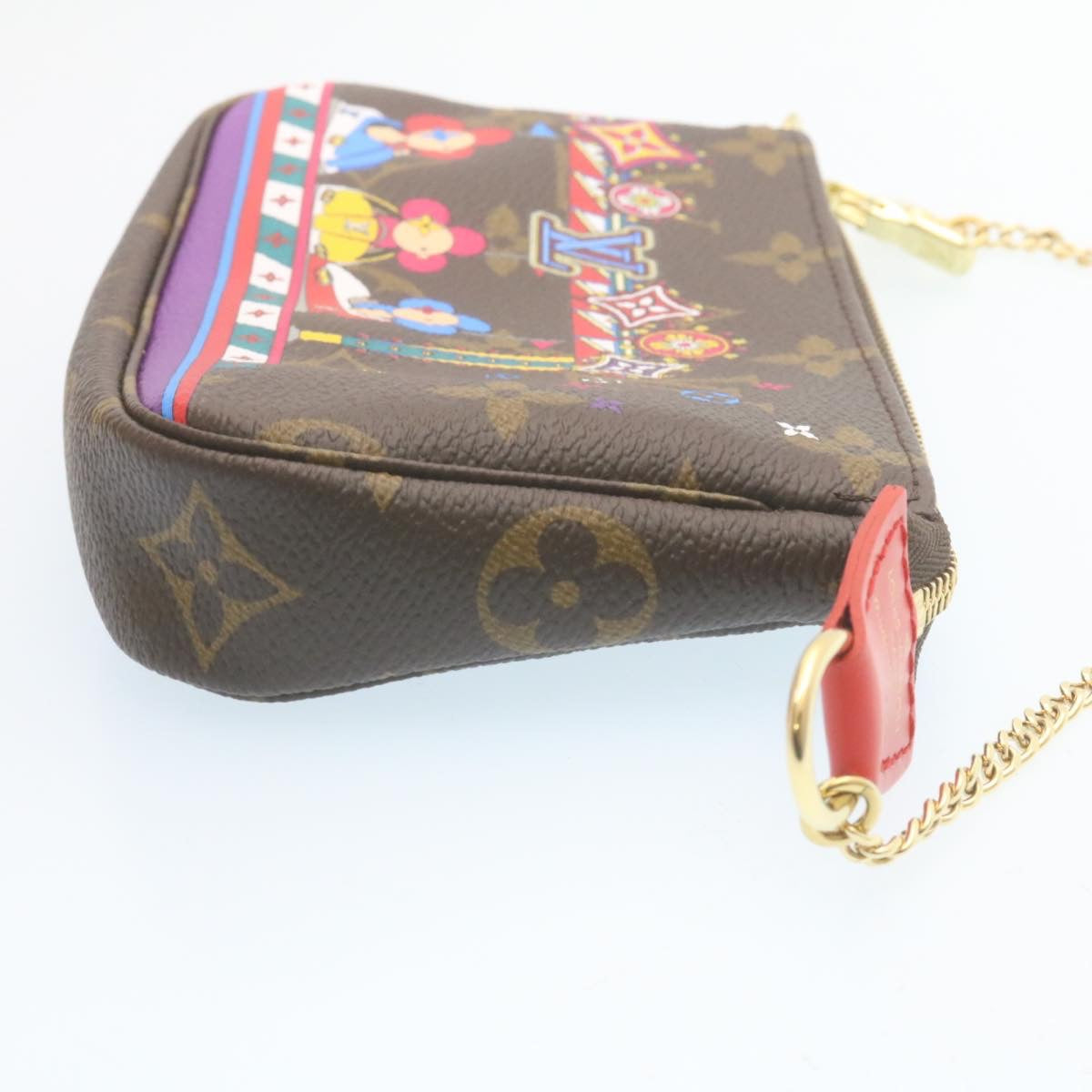 LOUIS VUITTON Monogram Vivienne Mini Pochette Accessoires M69976 Auth 28293A