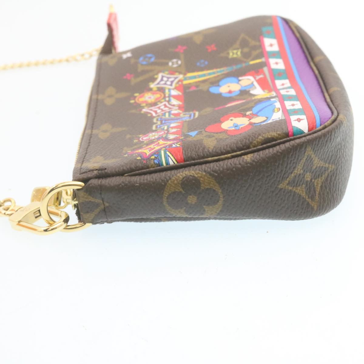 LOUIS VUITTON Monogram Vivienne Mini Pochette Accessoires M69976 Auth 28293A