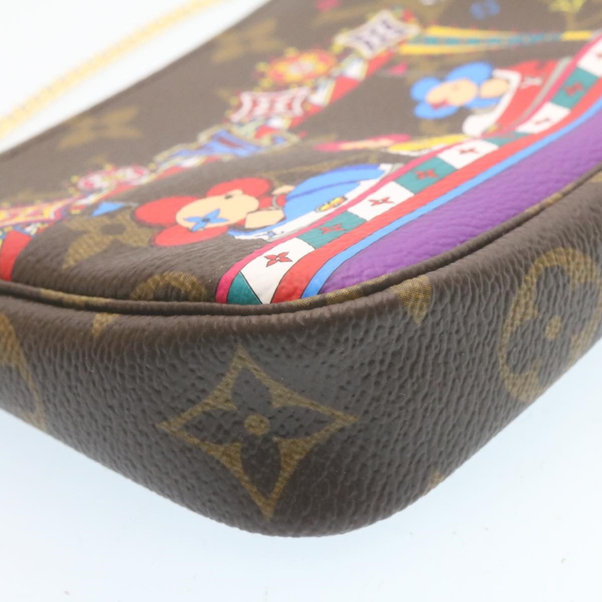 LOUIS VUITTON Monogram Vivienne Mini Pochette Accessoires M69976 Auth 28293A