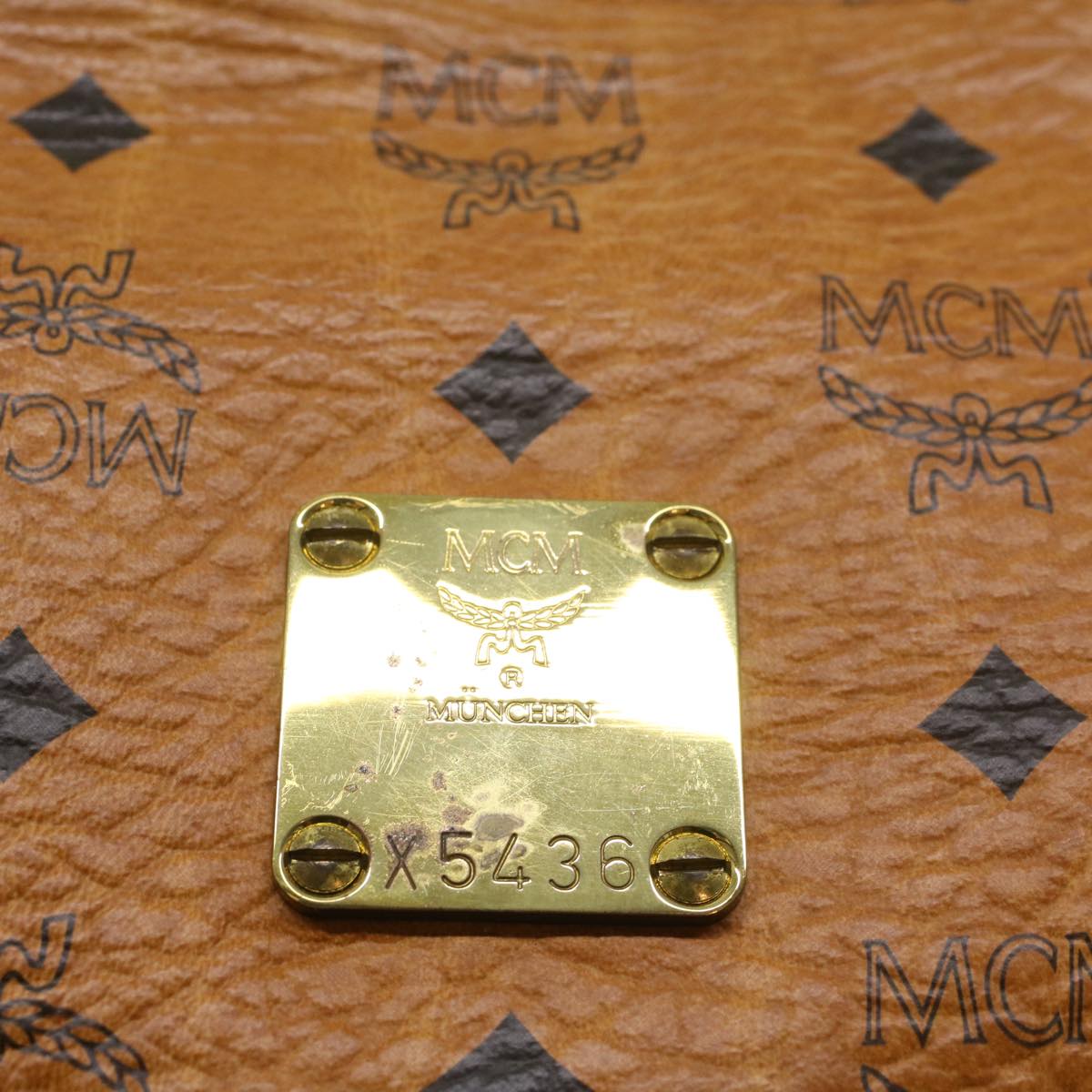 MCM Vicetos Logogram Clutch Bag PVC Leather Brown Auth 50583