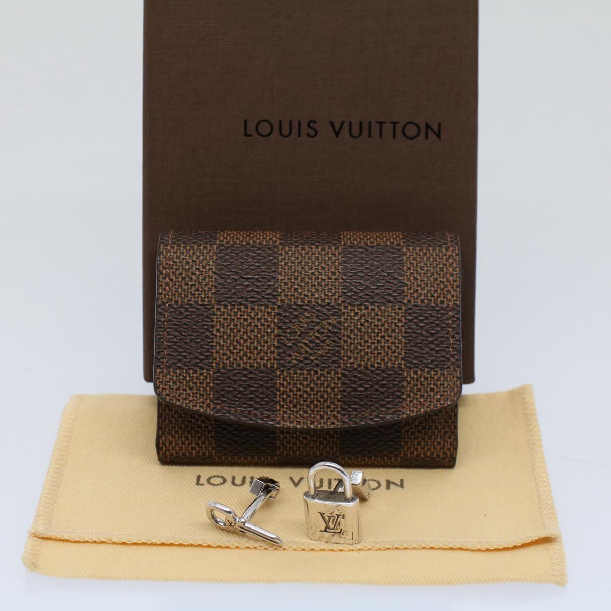 LOUIS VUITTON Damier Ebene Bouton De Manchette Cadena Eclet M64600 LV Auth 52910